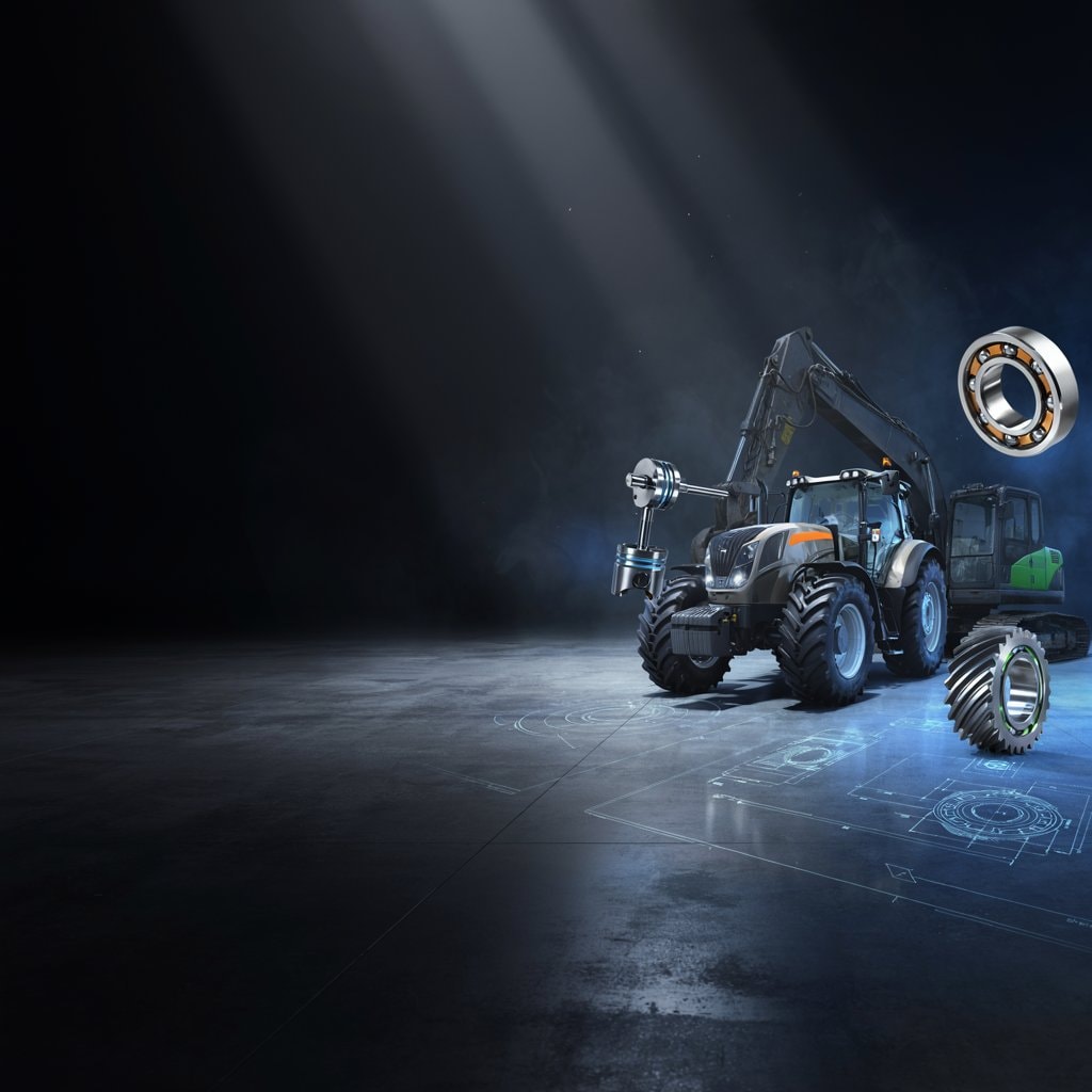 Tracteur et pelleteuse industrielle avec pièces mécaniques — roulement, engrenage et piston — dans un atelier premium AGSsolution